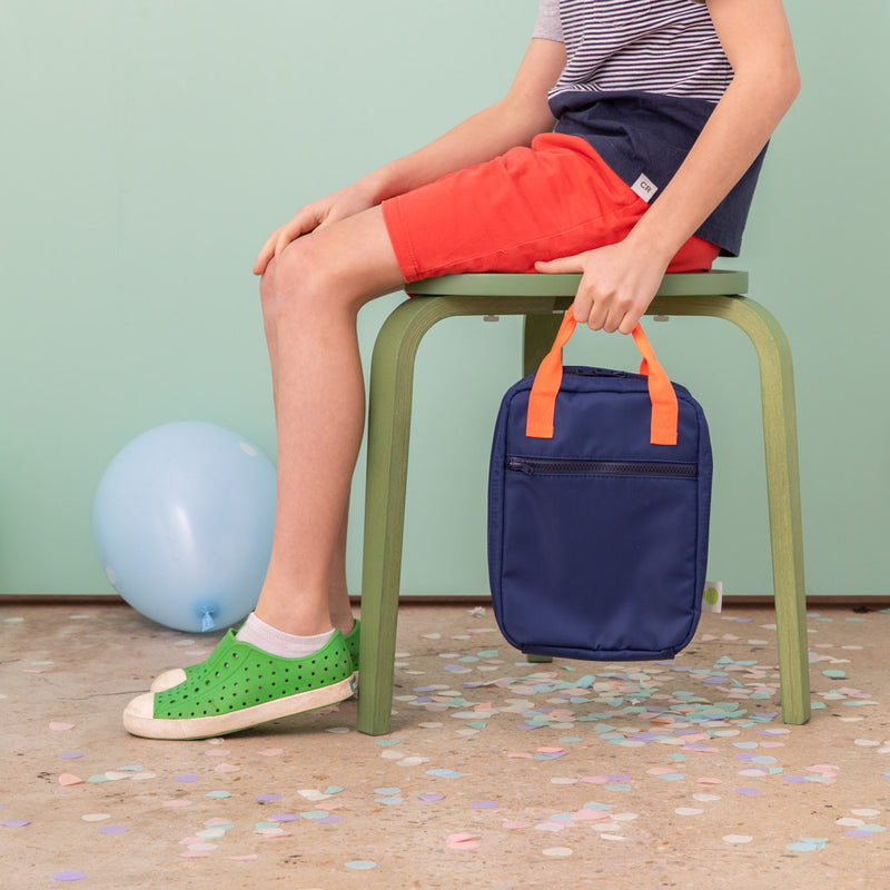 navy insulted kids lunch bag with bright orange handles - nudie rudie lunch box