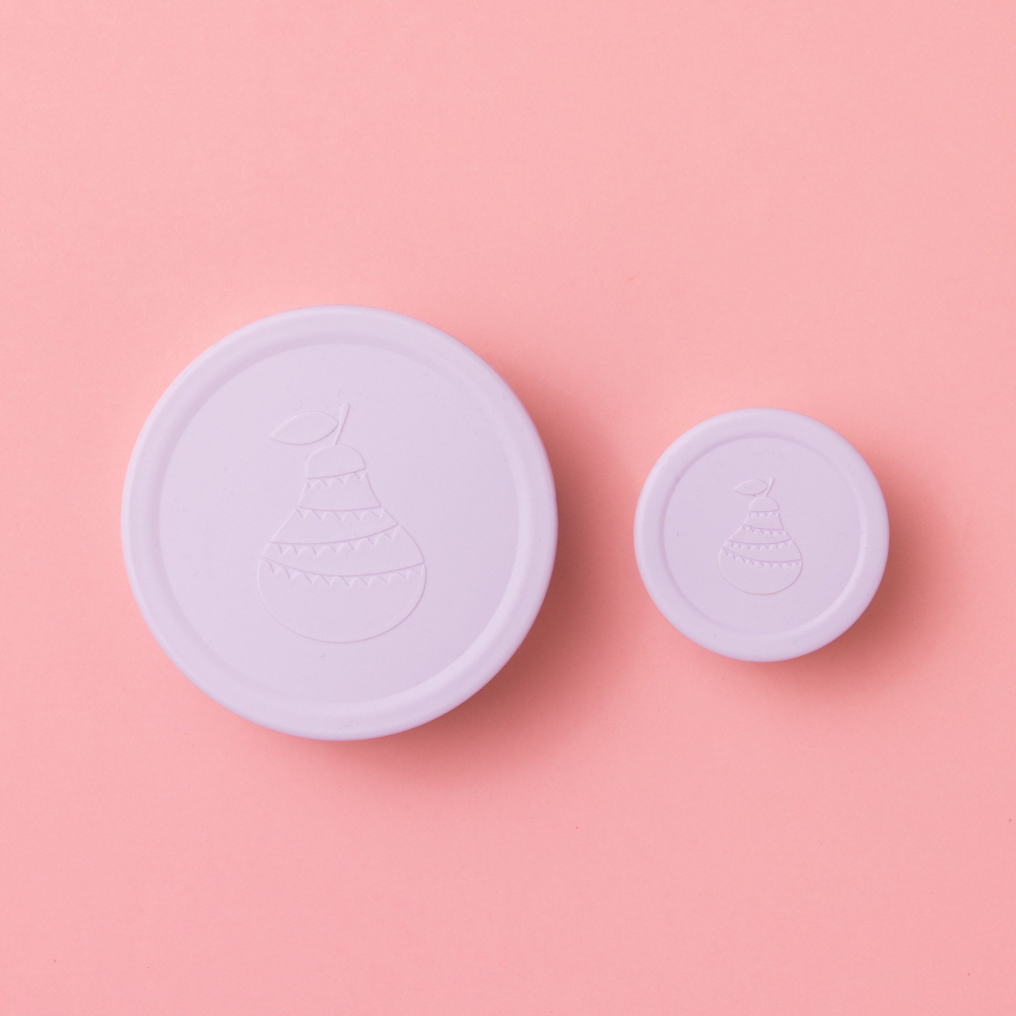 round stainless steel snacker pot sets with soft lilac lids and pear logo on top