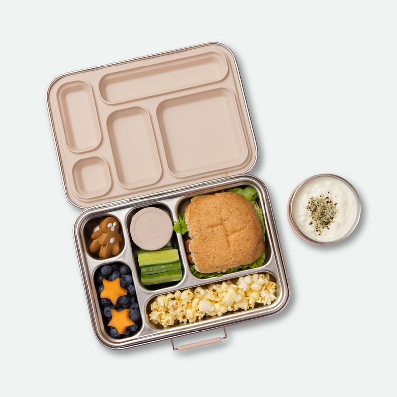 five compartment leak proof stainless steel lunch box with oatmeal silicone seal in lid full of food 