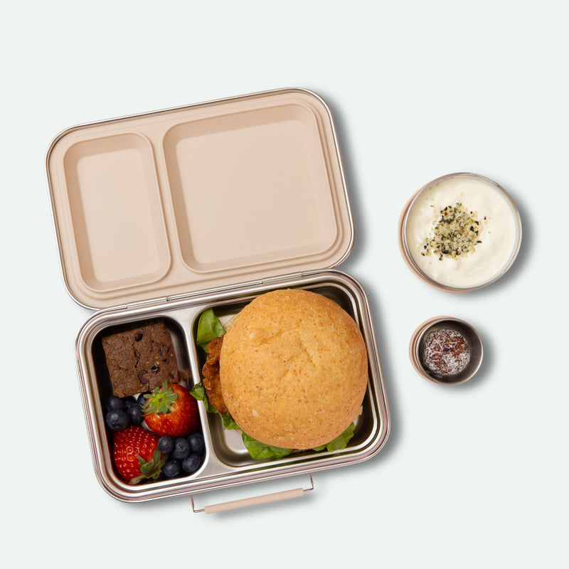 two compartment leak proof stainless steel lunch box with removable silicone seal in oatmeal empty