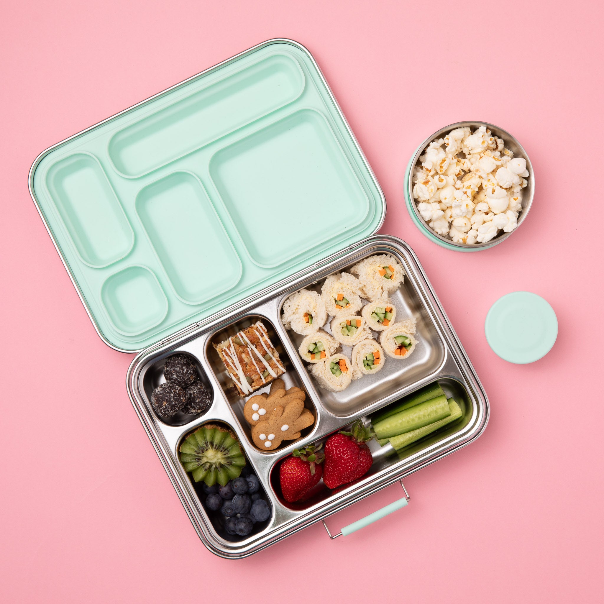 nudie rudie lunch box leak proof stainless steel bento style lunchbox with mint removable silicone seal on lid. comes with 2 additional snack pots