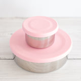 leak proof stainless steel snack container with pink silicone lid. nudie rudie lunch box