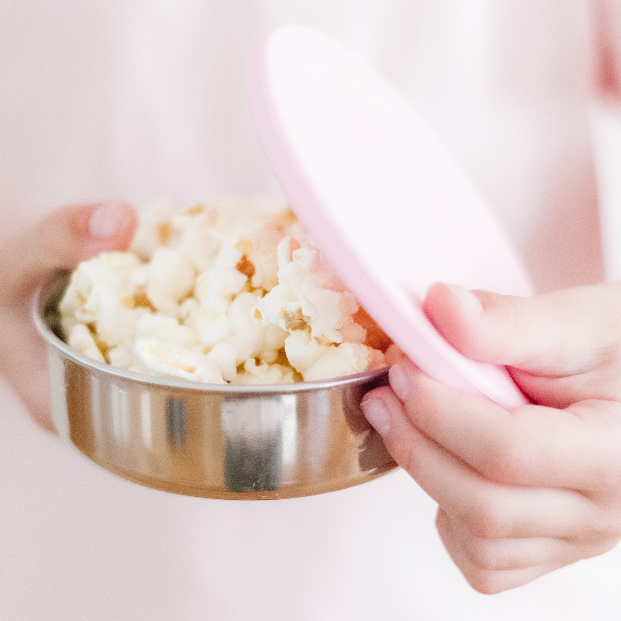 leak proof stainless steel snack container with pink silicone lid. nudie rudie lunch box